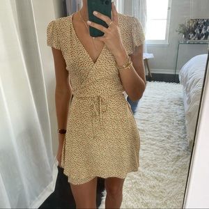 Yellow floral wrap dress